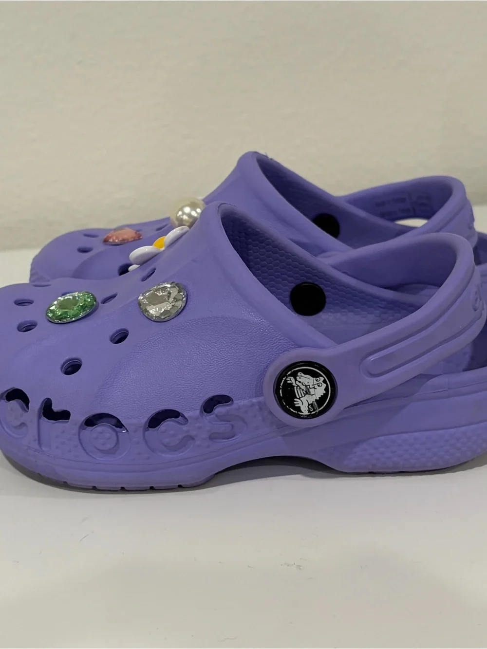 Girls size 9 toddler. Purple CROCS  Great Condition! Charms included